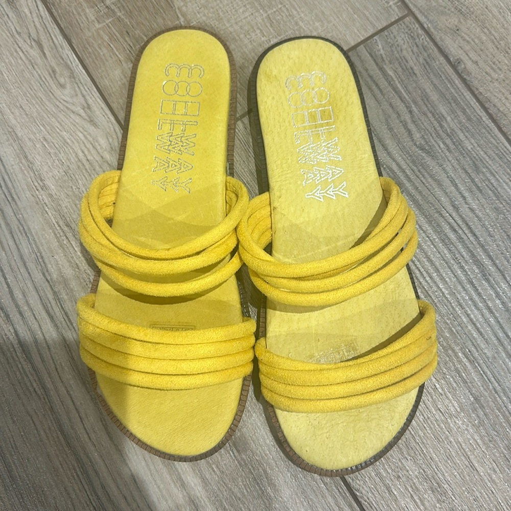 Flat yellow sandals